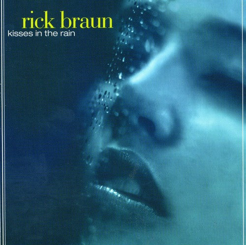 the album cover for Rick Braun - Kisses in the Rain