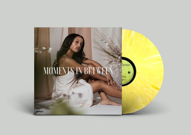 the album cover for Ruth B. - Moments In Between