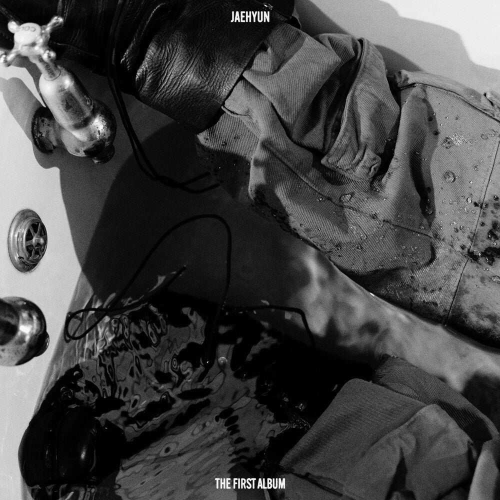the album cover for Jaehyun - Jaehyun - The 1st Album 'j' [Money Clip Ver.]