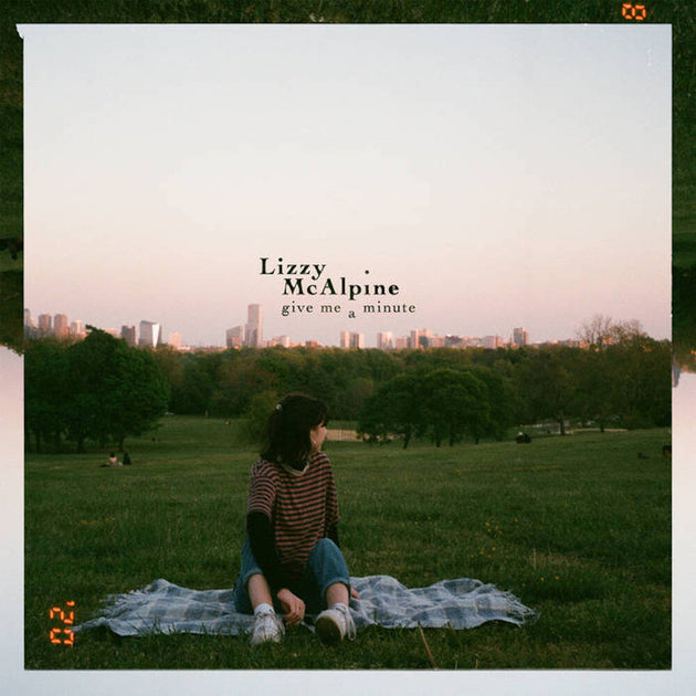 the album cover for Lizzy McAlpine - Give Me A Minute [Pink Colored Vinyl]