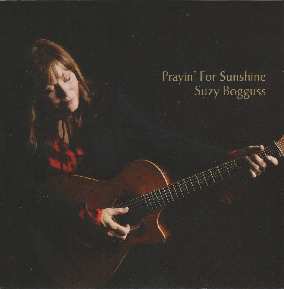 the album cover for Suzy Bogguss - Prayin' For Sunshine