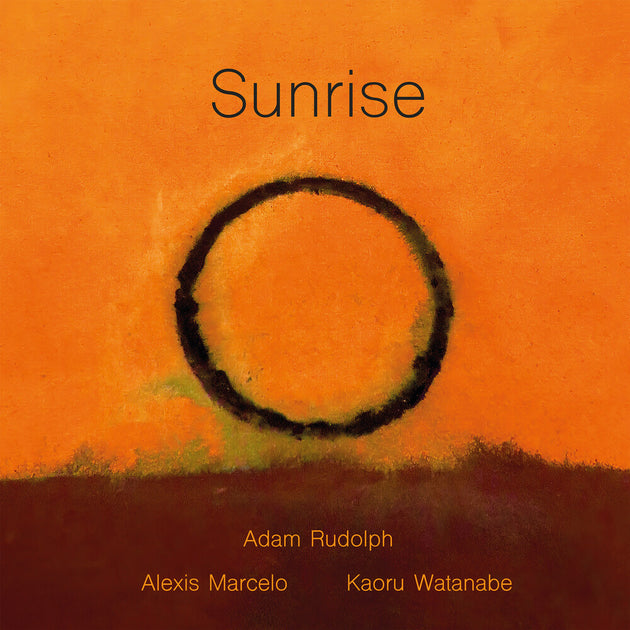 the album cover for Adam Rudolph - Sunrise