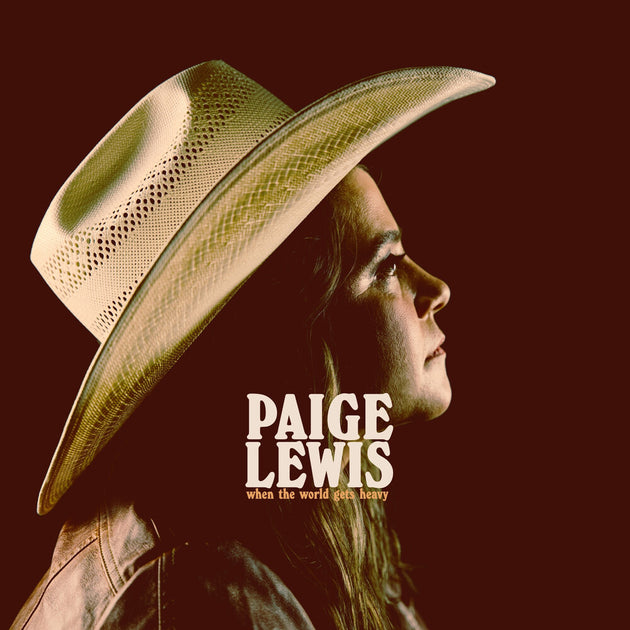 the album cover for Paige Lewis - When The World Gets Heavy