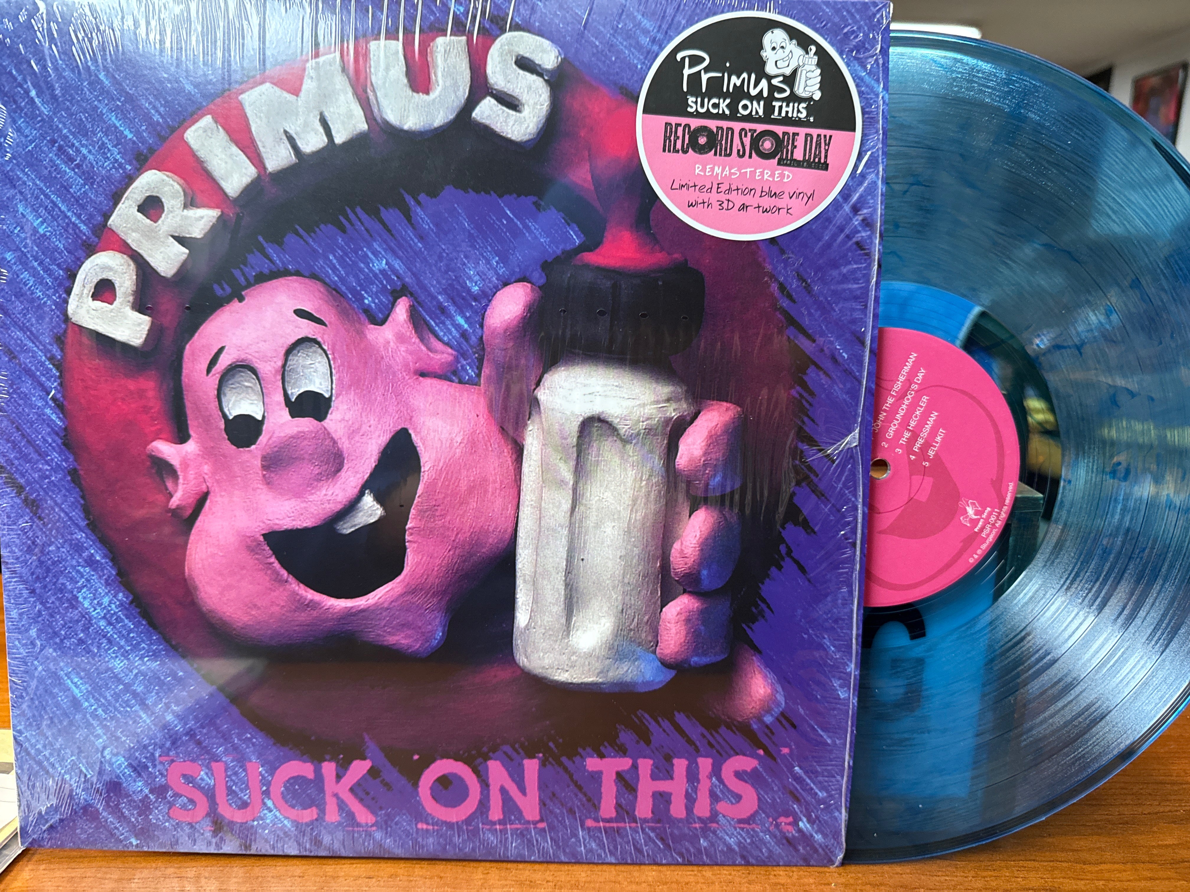 Primus - Suck On This (2020,  RSD, Blue Smoke Vinyl, USED)